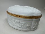 a white box with a gold trim around it