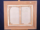 an old picture frame with a piece of paper taped to it on a easel