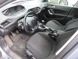 the interior of a car with a steering wheel and a dashboard