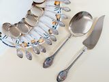 a plate with spoons and a plate with spoons and spoons on it