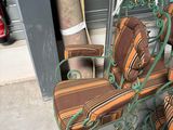 a lot of chairs and a chair that are outside