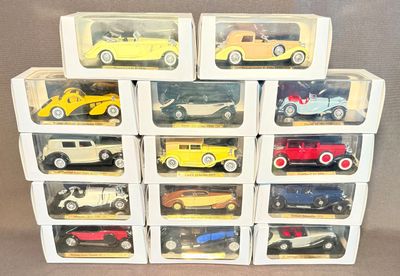 a lot of toy cars in the boxes on the table