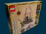 a box that has a lego pirate ship in it
