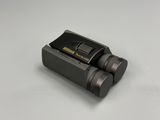 a pair of binoculars sitting on top of a table