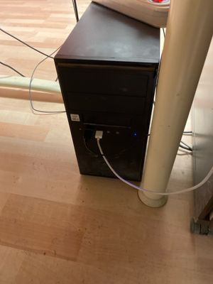 a computer that is sitting on top of a desk