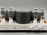 an image of a close up of a tube amplifier on a table