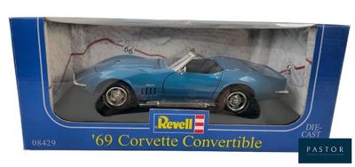 the box is open to show the model of a blue sports car