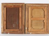 an old wooden box with a picture of a man and a woman in it
