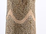 a dress with fringes on a mannequin mannequin mannequin mannequin mannequin mannequin mannequin mannequin mann