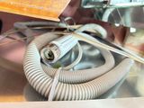 a hose that is connected to an electrical device