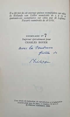 an open book with a picture of a man holding a tennis racquet