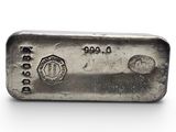 a silver bar on a white surface with a white background