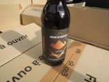 a bottle of beer that is sitting on a table