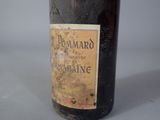 a bottle of wine that is sitting on a table