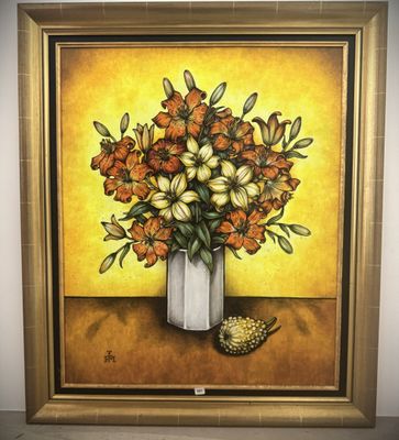 a painting of flowers in a vase on the wall