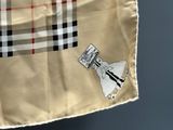 a small bag with a picture of a woman on it