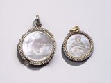 a pair of mother of pearl and diamond pendants