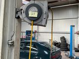 an image of a car being worked on in a garage