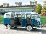 a small blue and white van parked in front of a building