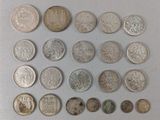 an image of a collection of old coins sitting on a table