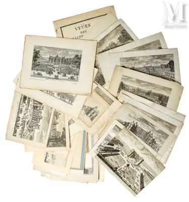 une pile de vieux livres sur lesquels figurent des images de bâtiments
