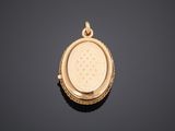 a gold locke with a medallion on the front of it