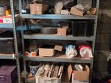 many boxes and boxes on the shelves in the room