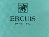 the back of a blue purse with a horse on it
