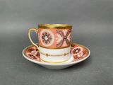 an image of a cup and saucer sitting on a saucer