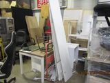 a lot of furniture in a room with a lot of boxes