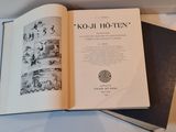 a book open on a table with a picture on it