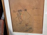 une photo représentant un homme et une femme assis sur une chaise