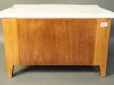 an image of a small wooden chest with a marble top