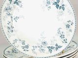 many plates stacked on top of each other on a table