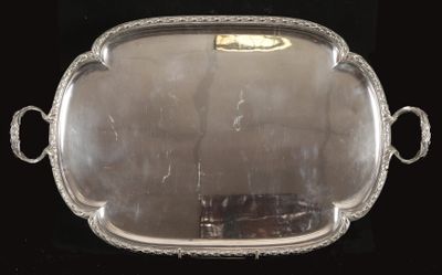 a silver tray with handles on a black background