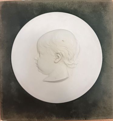 "Portrait d'enfant" médaillon en biscuit.