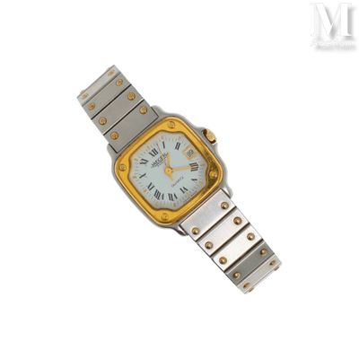 a silver and gold wrist watch with a yellow face