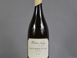 a bottle of wine that is sitting on a table