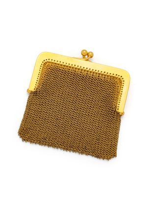 a gold mesh purse on a white background