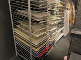 a lot of papers on the shelves in the store