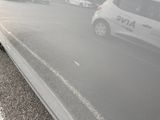 a car that is parked on the side of the road