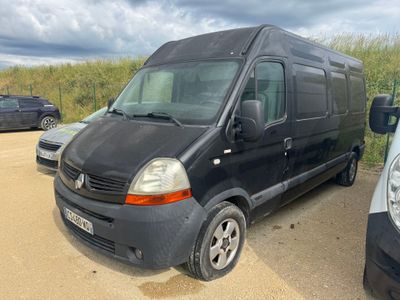 a black van that is parked in a parking lot