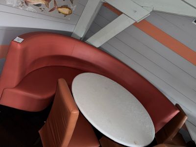 a small table and chairs in a corner of a room