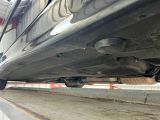 a close up view of a car ' s exhaust pipe and exhaust pipe