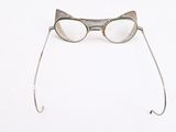 a pair of glasses with a cat ' s eye on it