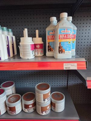 a shelf with many different types of products on it