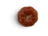 a donut that is sitting on a white surface