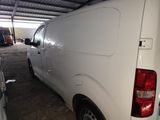a white van that is parked in a garage