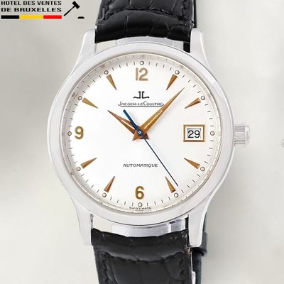 an image of a watch with a white dial and black leather strap