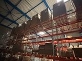 a large warehouse with lots of boxes on the shelves